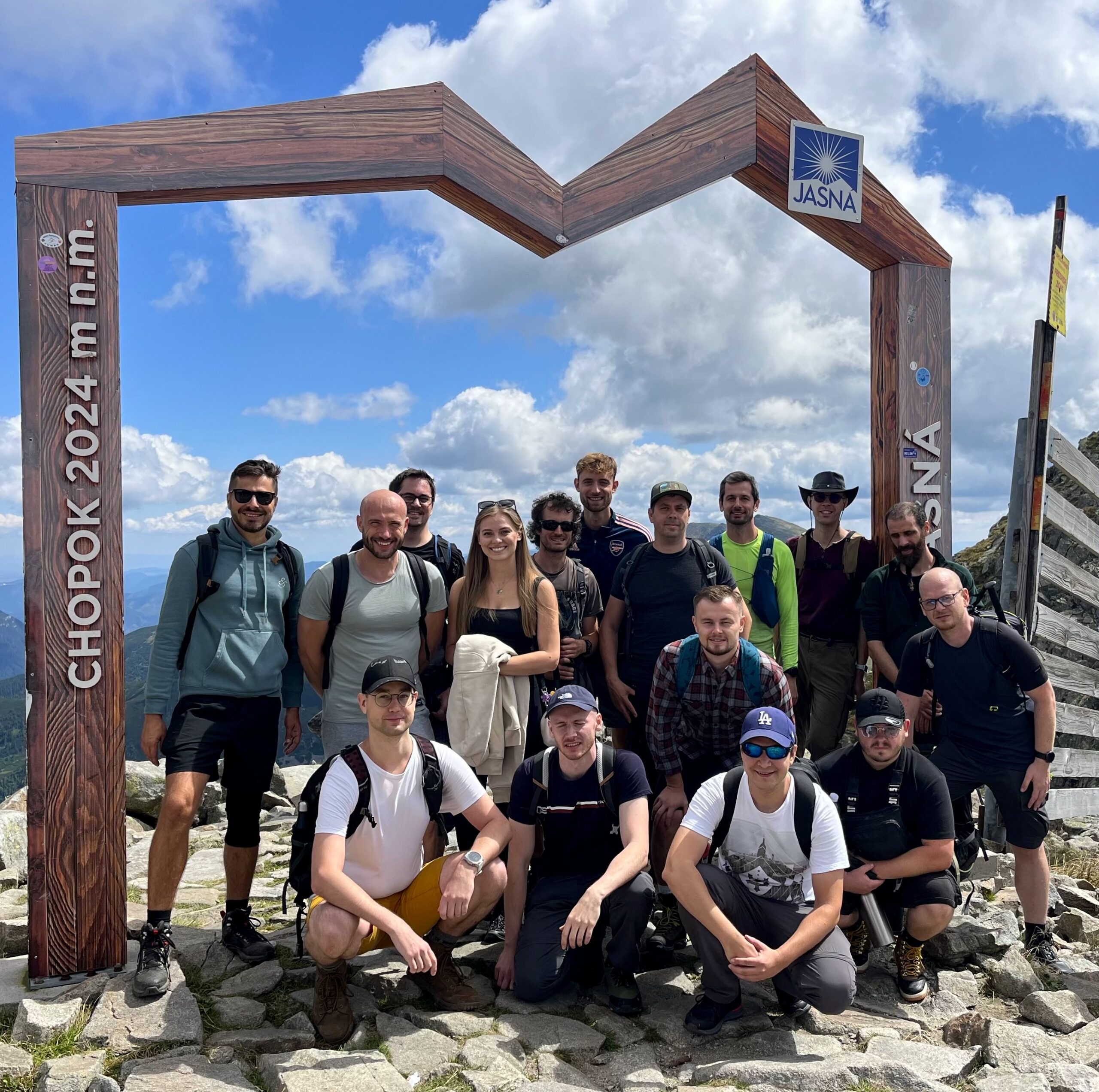 The team poses for a photo on top of the Chopok peak, in the Low Tatras, Slovakia, during this year's team building.